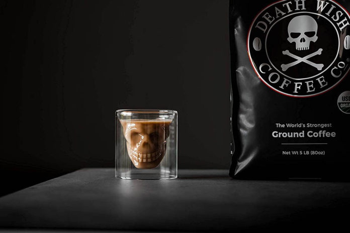 DEATH-WISH-COFFEE-Dark-Roast-Coffee-Grounds-and-a-cup-of-coffee